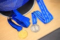 【PHOTO】会場前には、岩渕真奈のメダルなどが展示された。｜写真：鈴木颯太朗