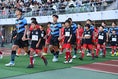 【選手権岡山県予選決勝PHOTO】岡山学芸館１－０就実｜エスコートキッズと共に選手入場！｜写真：鈴木颯太朗